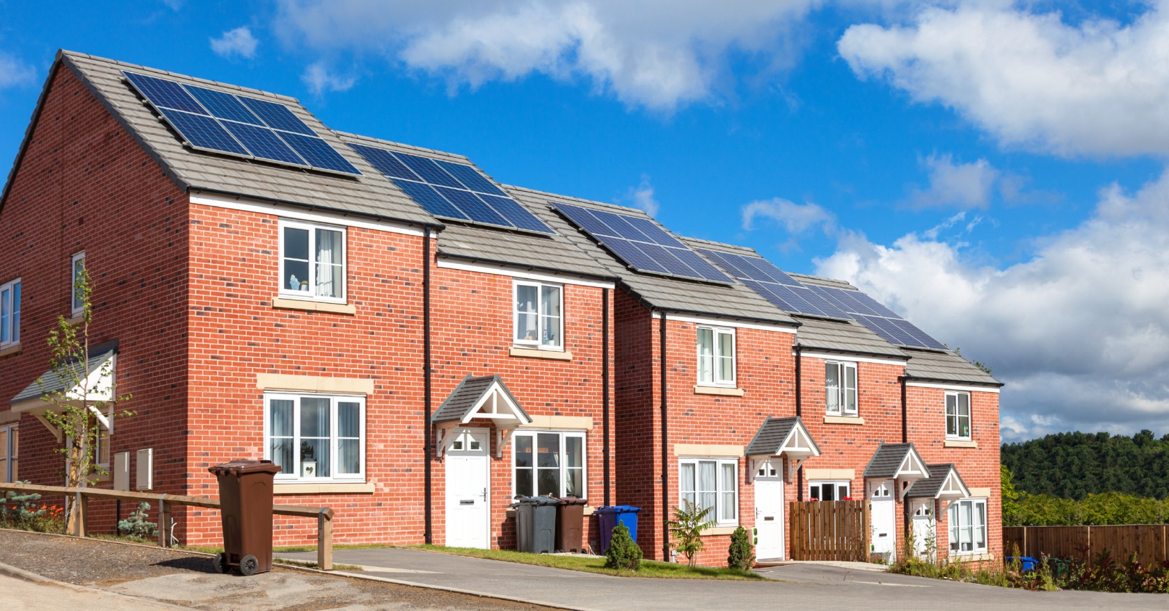Row of houses with solar PV installed.