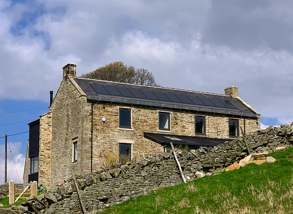 Country home with solar panels.