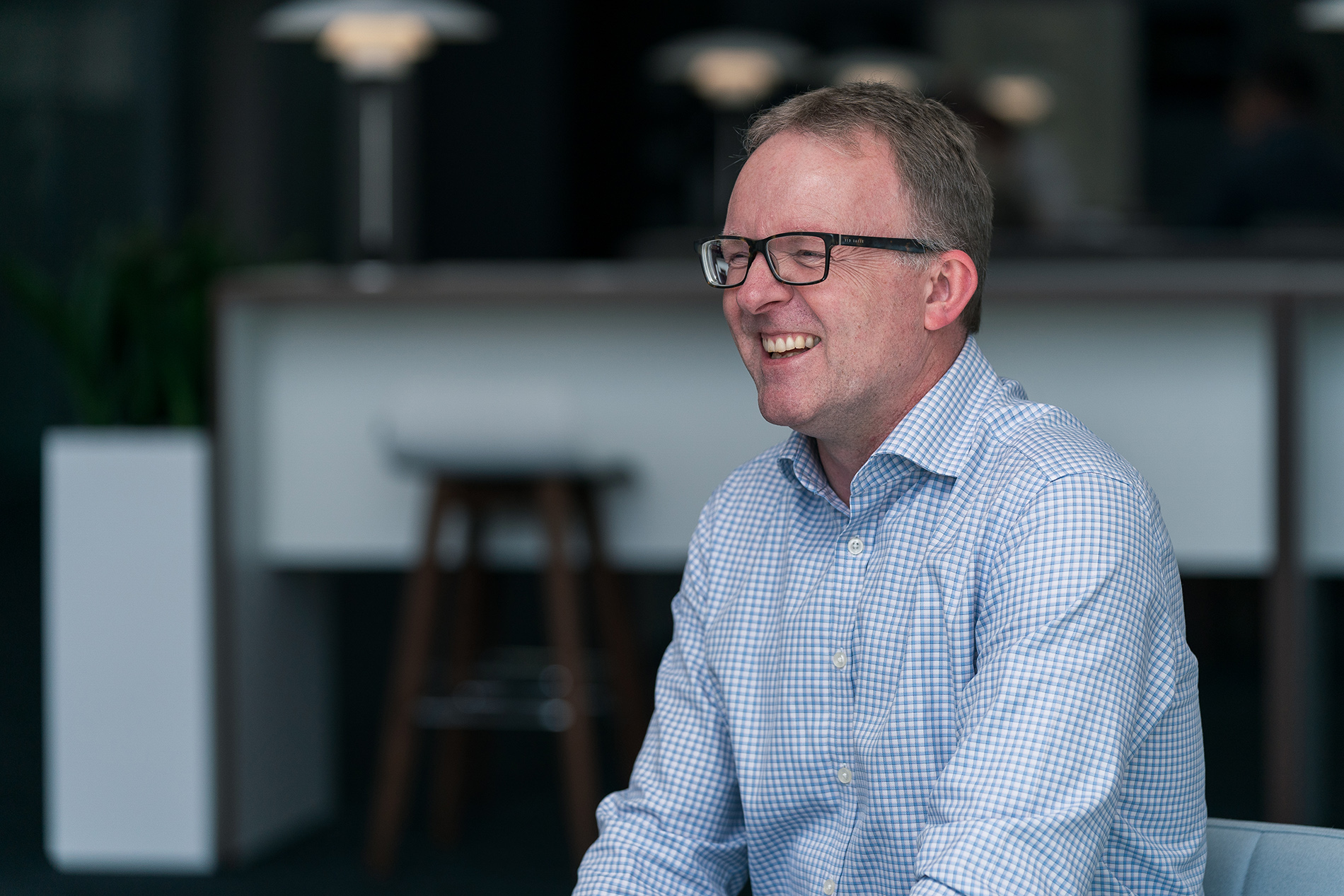 Ian Rippin, MCS CEO, laughing.