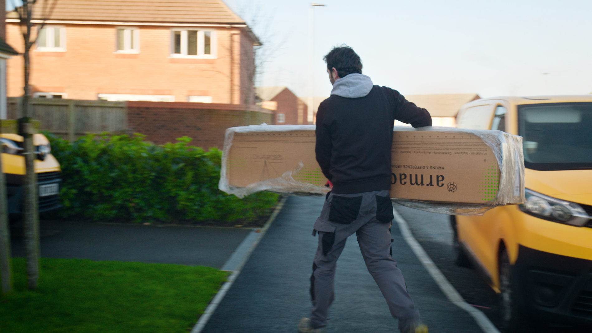 Installer carrying parts.