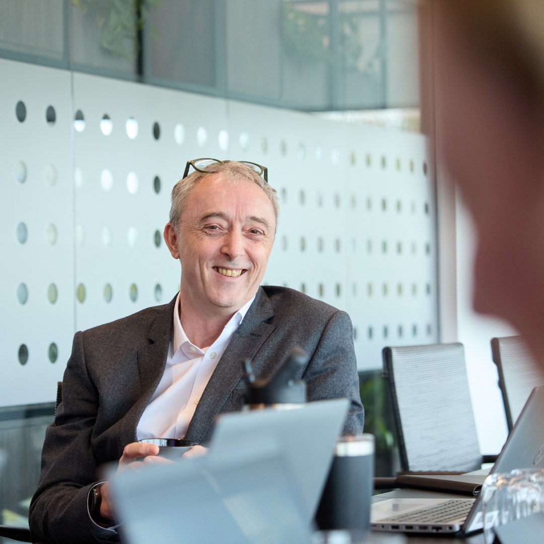 Man with glasses on head.