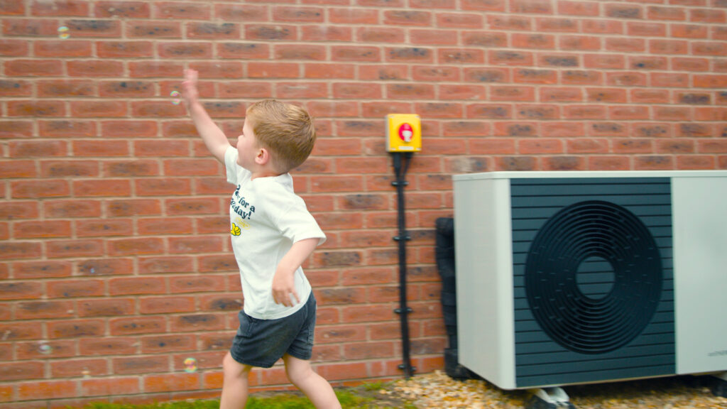 little boy with bubble ad heat pump